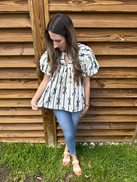 The White & Navy Ribbon Ruffle Blouse