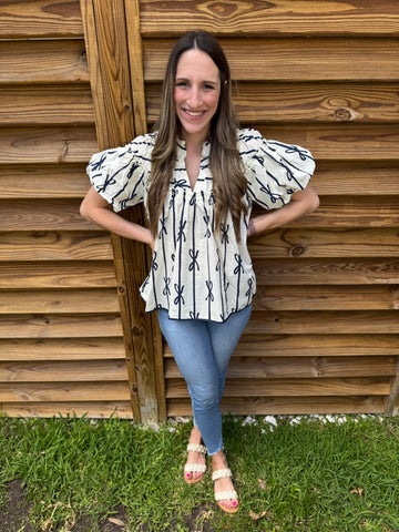 The White & Navy Ribbon Ruffle Blouse