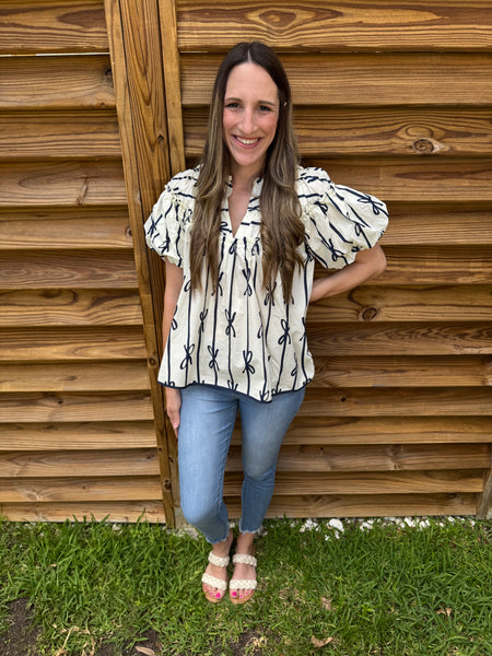 The White & Navy Ribbon Ruffle Blouse