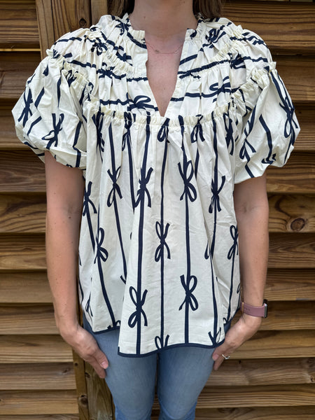 The White & Navy Ribbon Ruffle Blouse